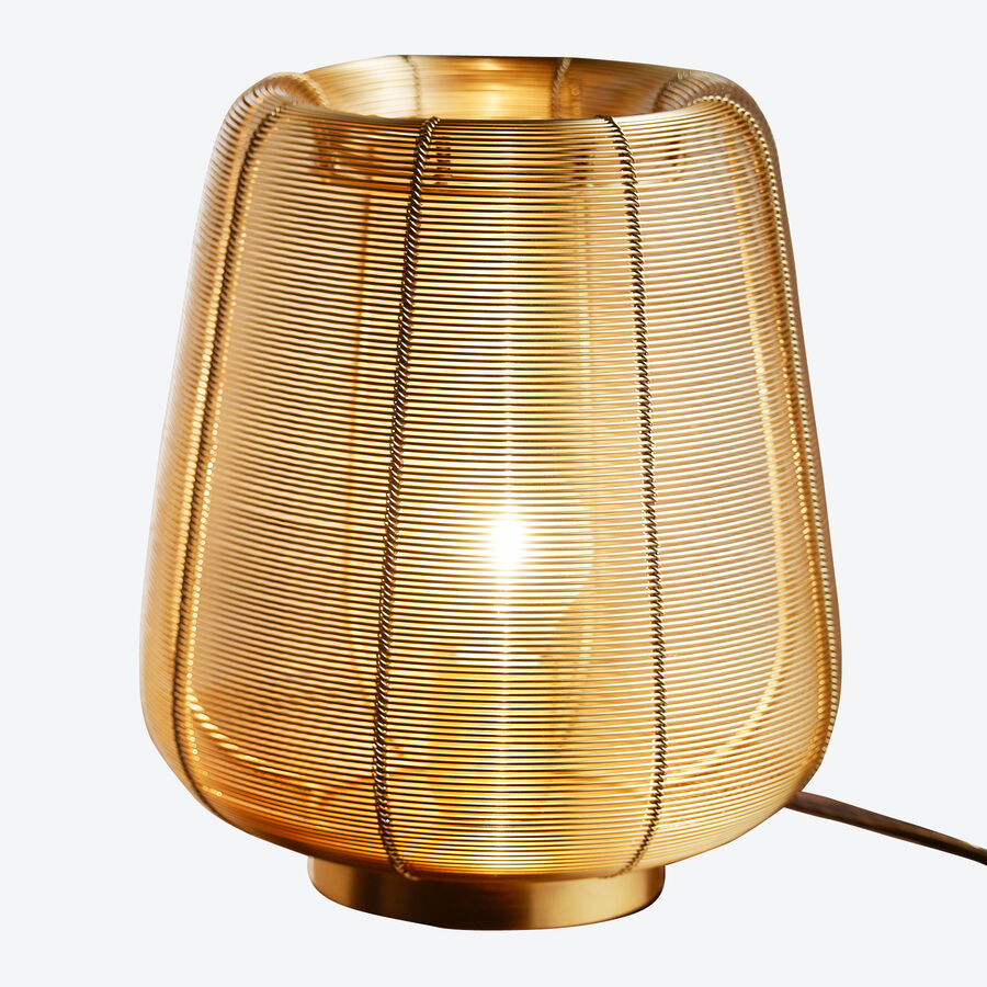 Dekorative Lampe in der Trendfarbe Gold