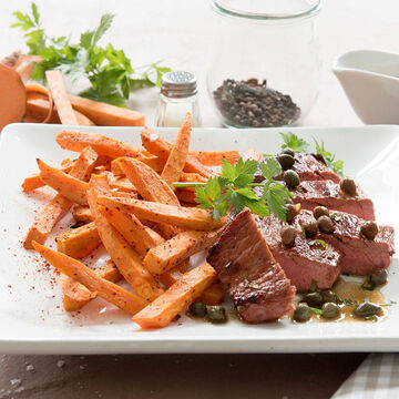 Produktbild für 'Kalbsschnitzel mit Kapernsauce und Süßkartoffel Pommes frites'