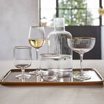 Produktbild für 'Exquisite Vintage-Cocktailglas und -Sektschale mit elegantem Goldrand'