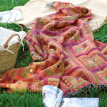 Produktbild für 'Kunstvolles Patchwork-Plaid aus italienischer Traditionsweberei'